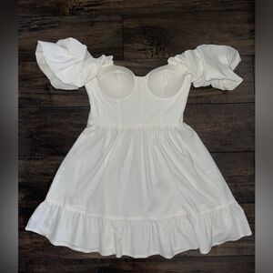 The perfect white off/ on shoulder ruffled corset flowy dress.